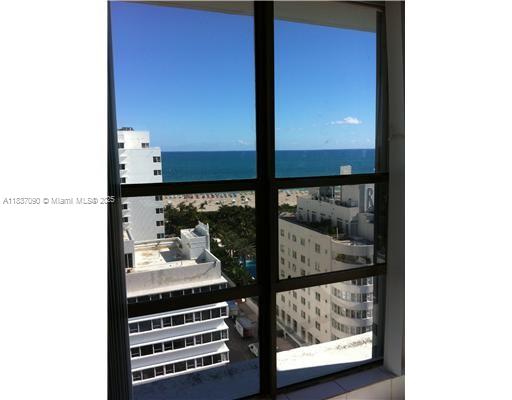 1800 Collins Avenue, Unit 18F Miami Beach, FL 33139 - Photo 16 of 22 a view of living room with furniture and window