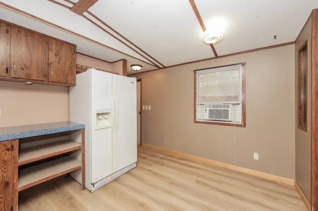 a view of a kitchen with a sink