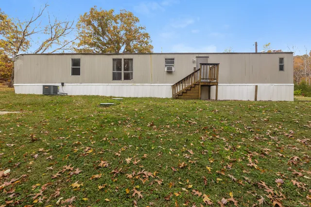an aerial view of house with an outdoor space