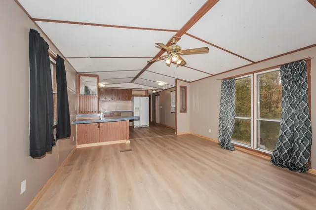 a kitchen with sink cabinets and stainless steel appliances