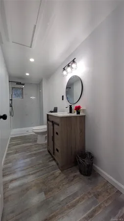 a bathroom with a tub and a sink