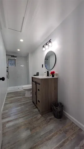 a bathroom with a tub and a sink