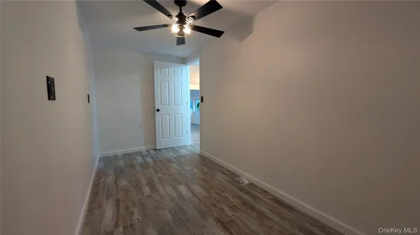 a view of a swimming pool with a yard