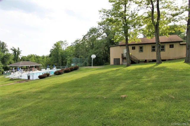 a view of a house with a park