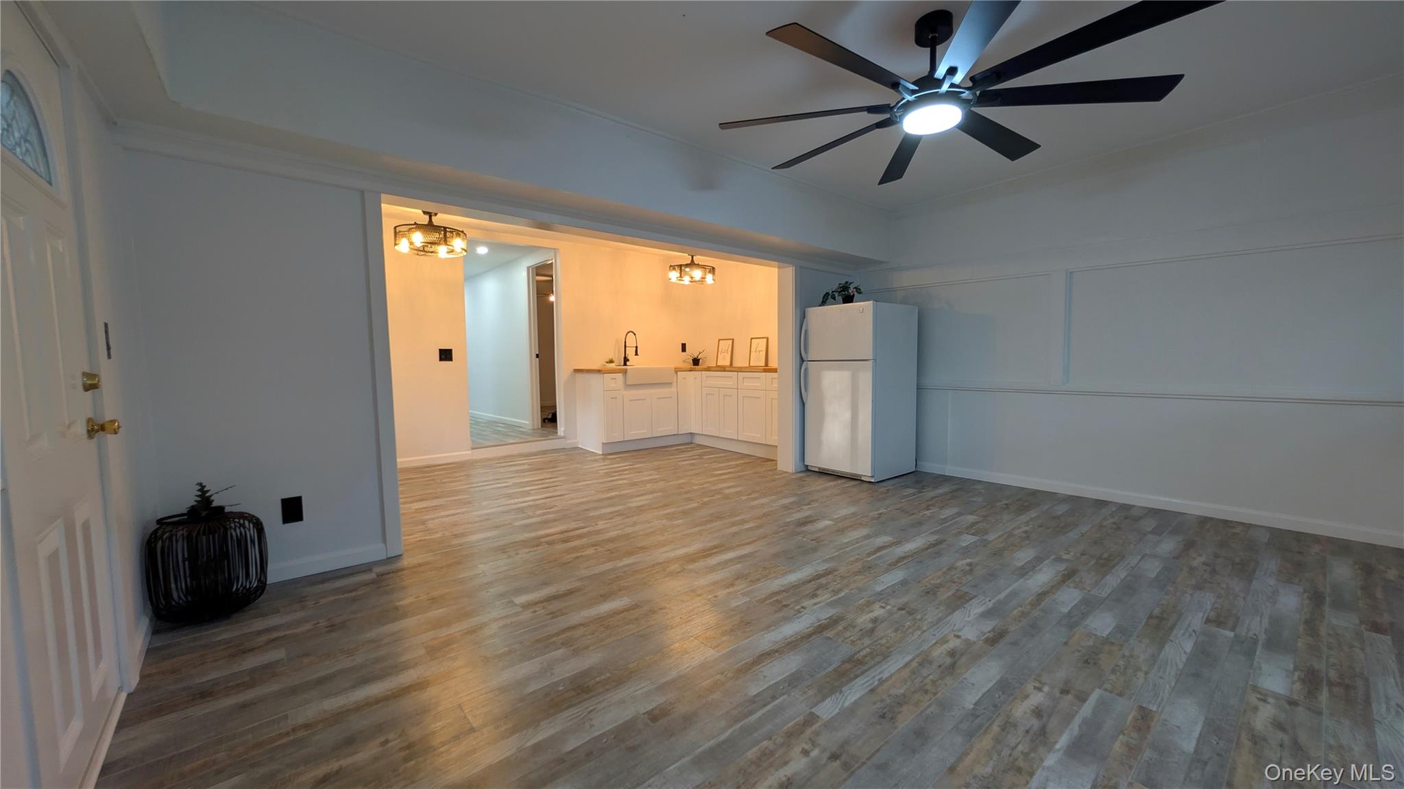 191 Sylvan Lake Road, Unit 30 Hopewell Junction, NY 12533 - Photo 9 of 34 wooden floor in an empty room with a window
