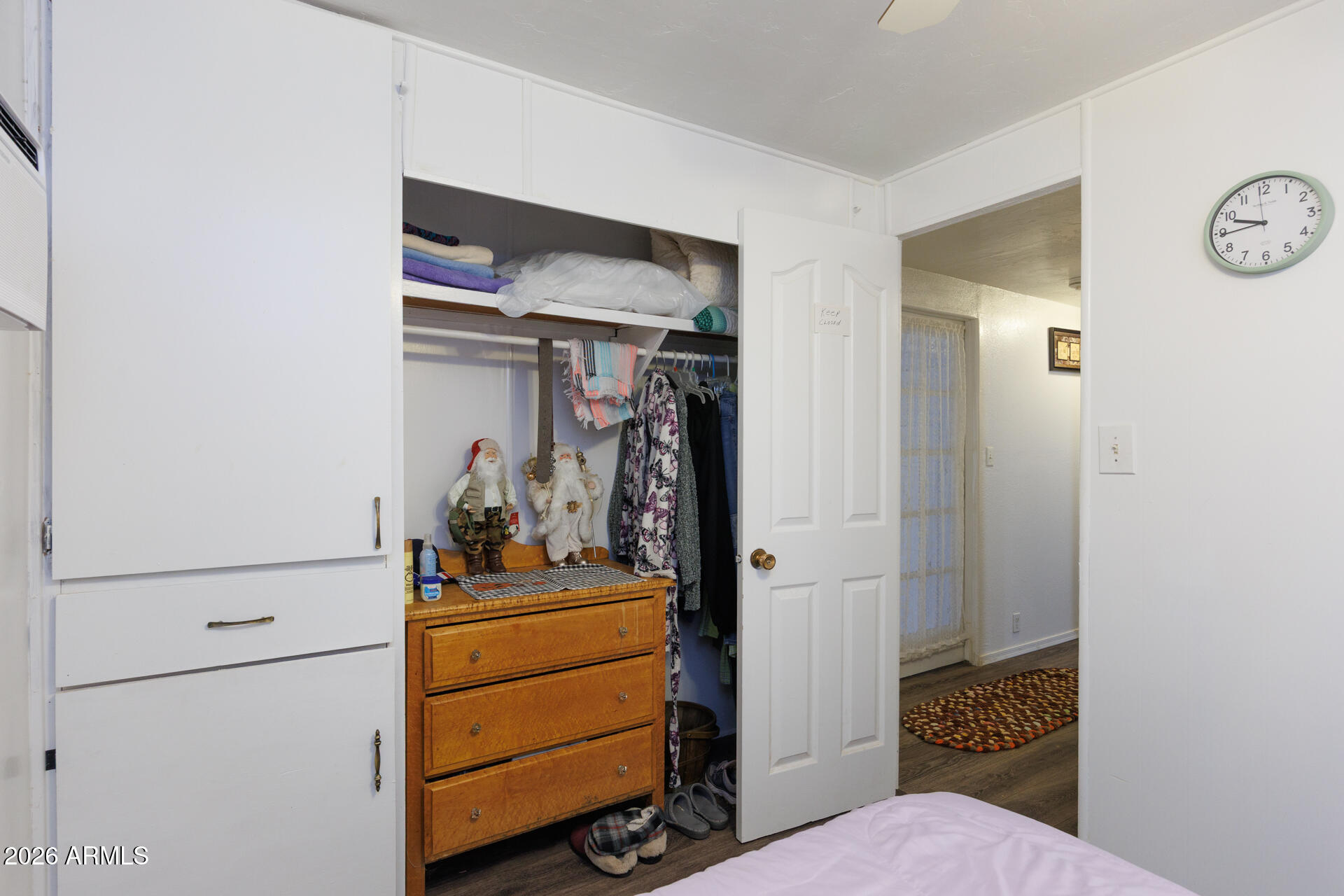 6185 East Monitor Street Picacho, AZ 85141 - Photo 35 of 55 a bedroom with a closet and a mirror