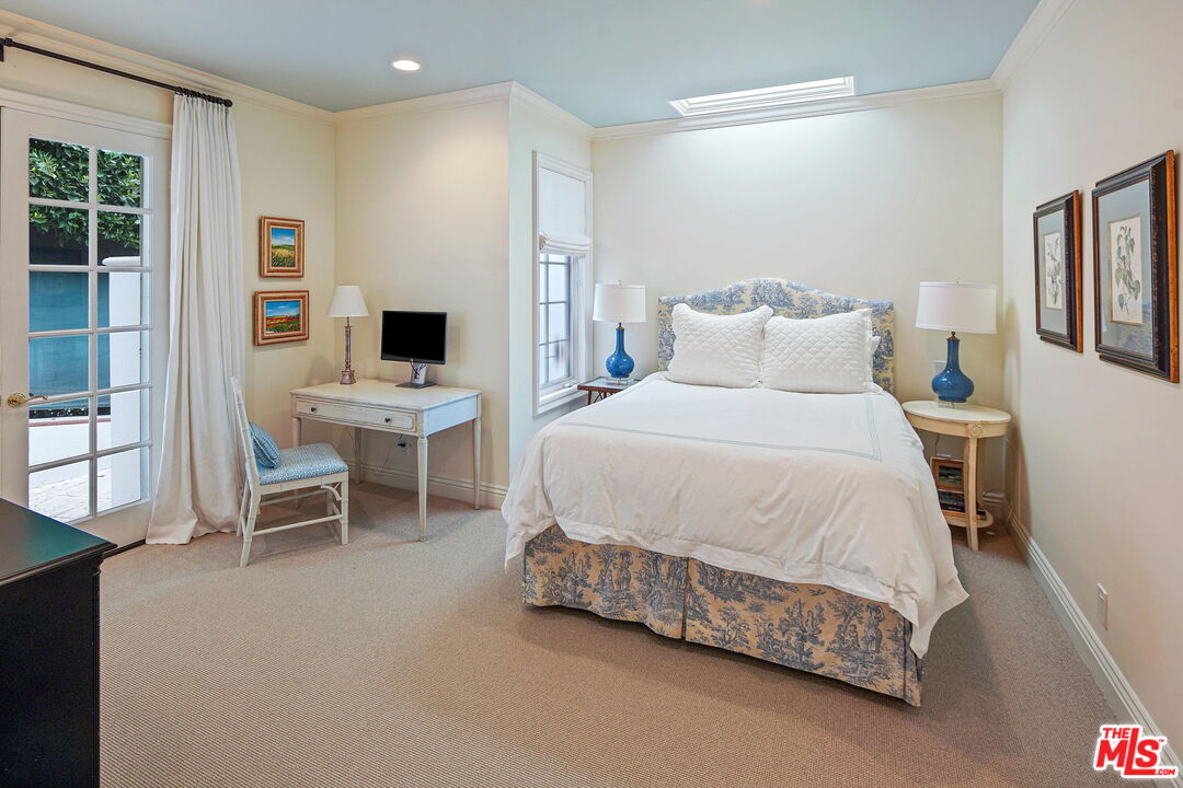 541 Paseo Miramar Pacific Palisades, CA 90272 - Photo 32 of 50 a living room with furniture and a large window