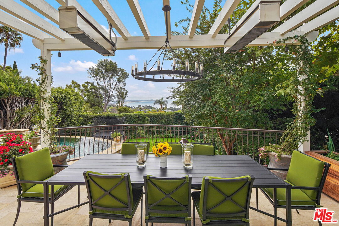 541 Paseo Miramar Pacific Palisades, CA 90272 - Photo 37 of 50 a view of a chairs and table in patio
