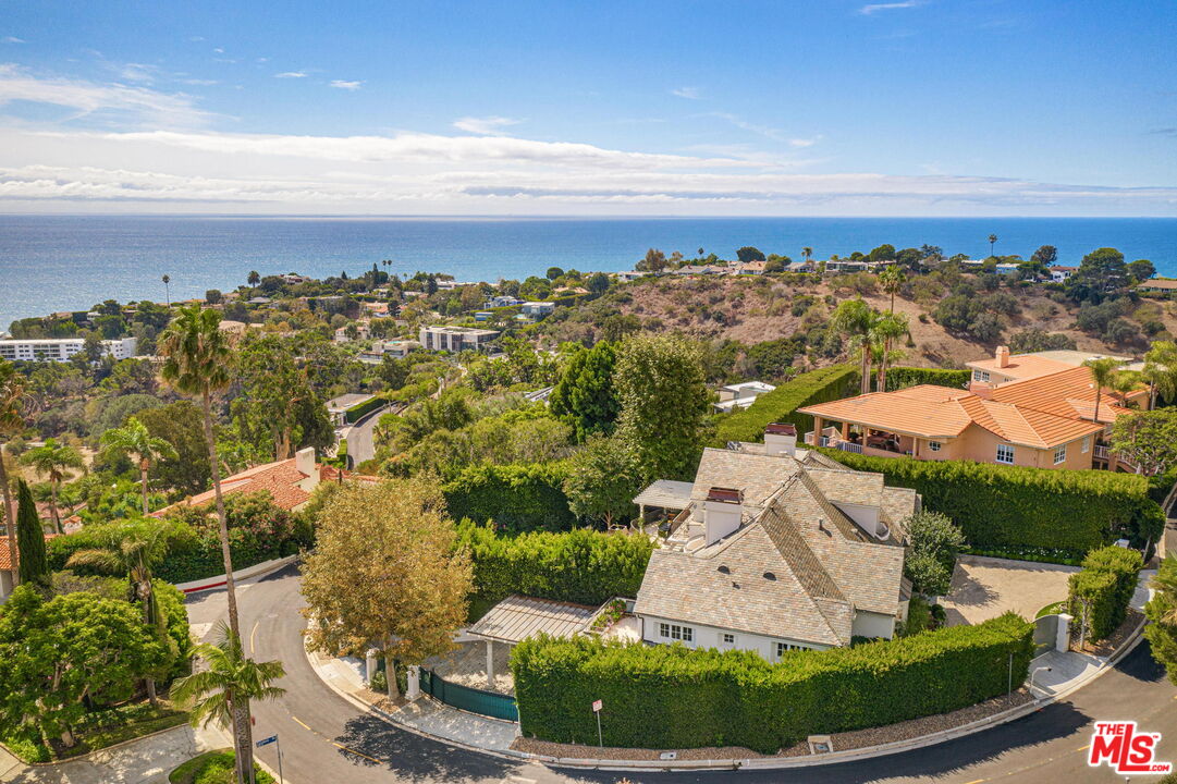 541 Paseo Miramar Pacific Palisades, CA 90272 - Photo 46 of 50 an aerial view of a house with a swimming pool