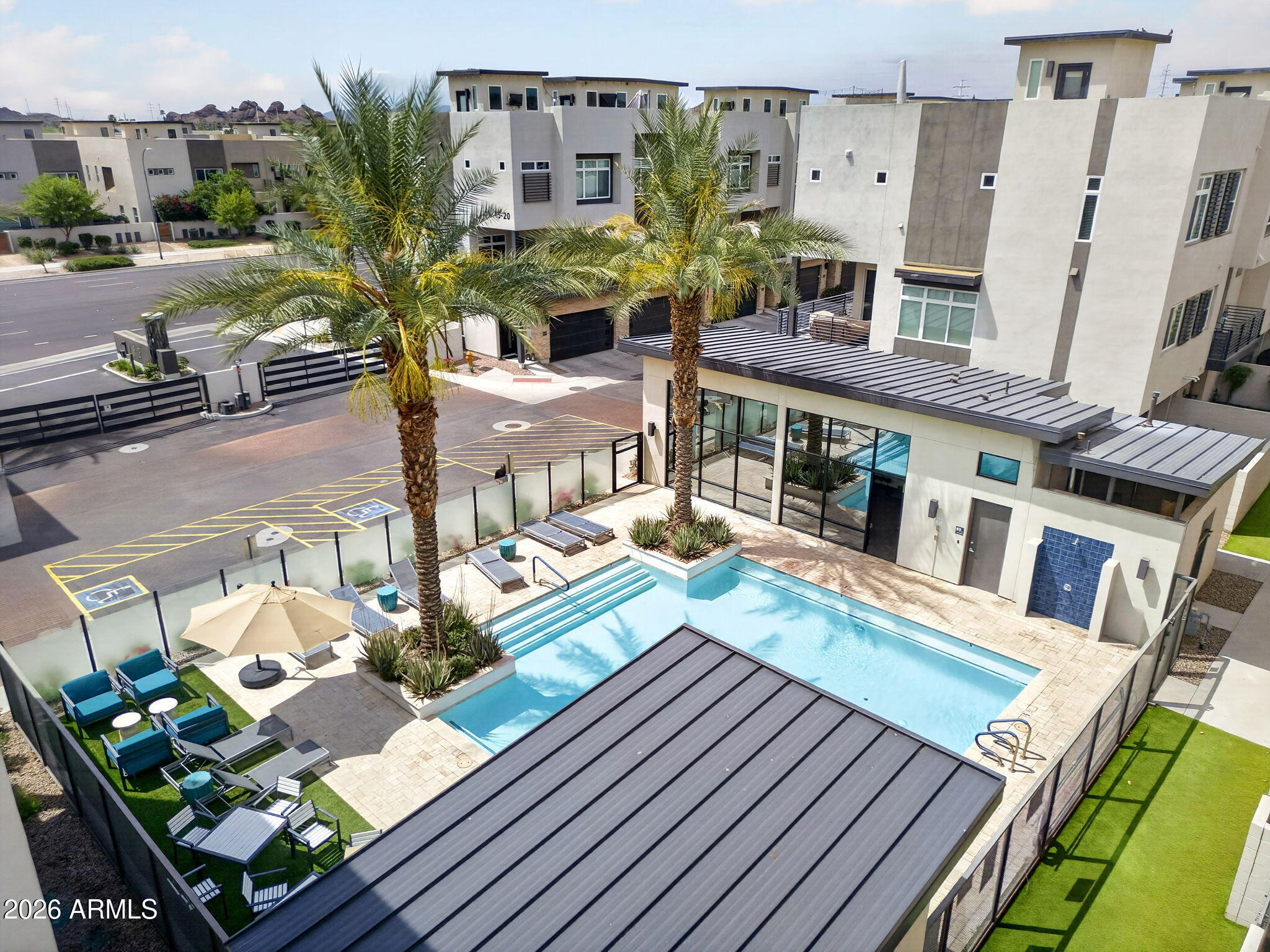 6850 East McDowell Road, Unit 14 Scottsdale, AZ 85257 - Photo 40 of 48 Community Pool with Lounge Seating