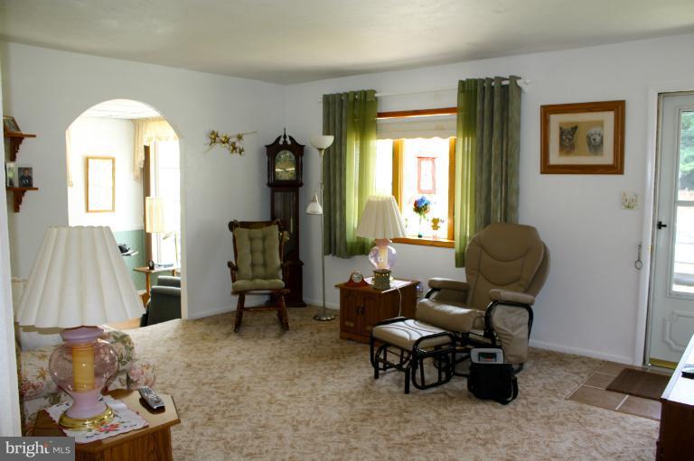 3711 Red Grove Road Baltimore, MD 21220 - Photo 1 of 24 a living room with furniture and a window
