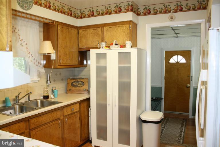 3711 Red Grove Road Baltimore, MD 21220 - Photo 2 of 24 a bathroom with a sink a toilet and shower