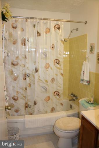 3711 Red Grove Road Baltimore, MD 21220 - Photo 15 of 24 a bathroom with a toilet and a shower