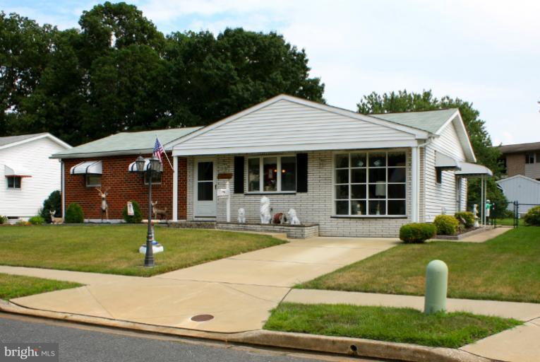 3711 Red Grove Road Baltimore, MD 21220 - Photo 24 of 24 a front view of a house with garden