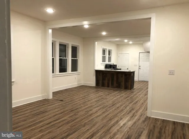 a view of kitchen with sink and cabinet