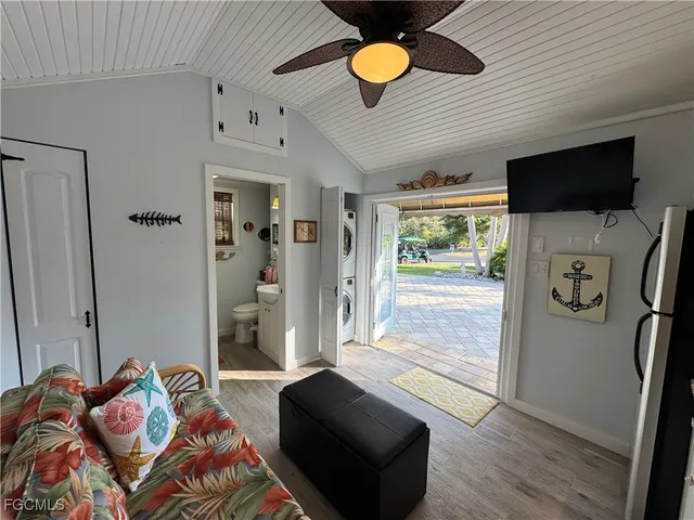 a bedroom with furniture and a window