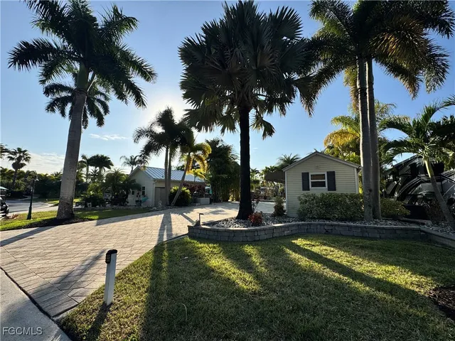 a view of a swimming pool with a table and chairs