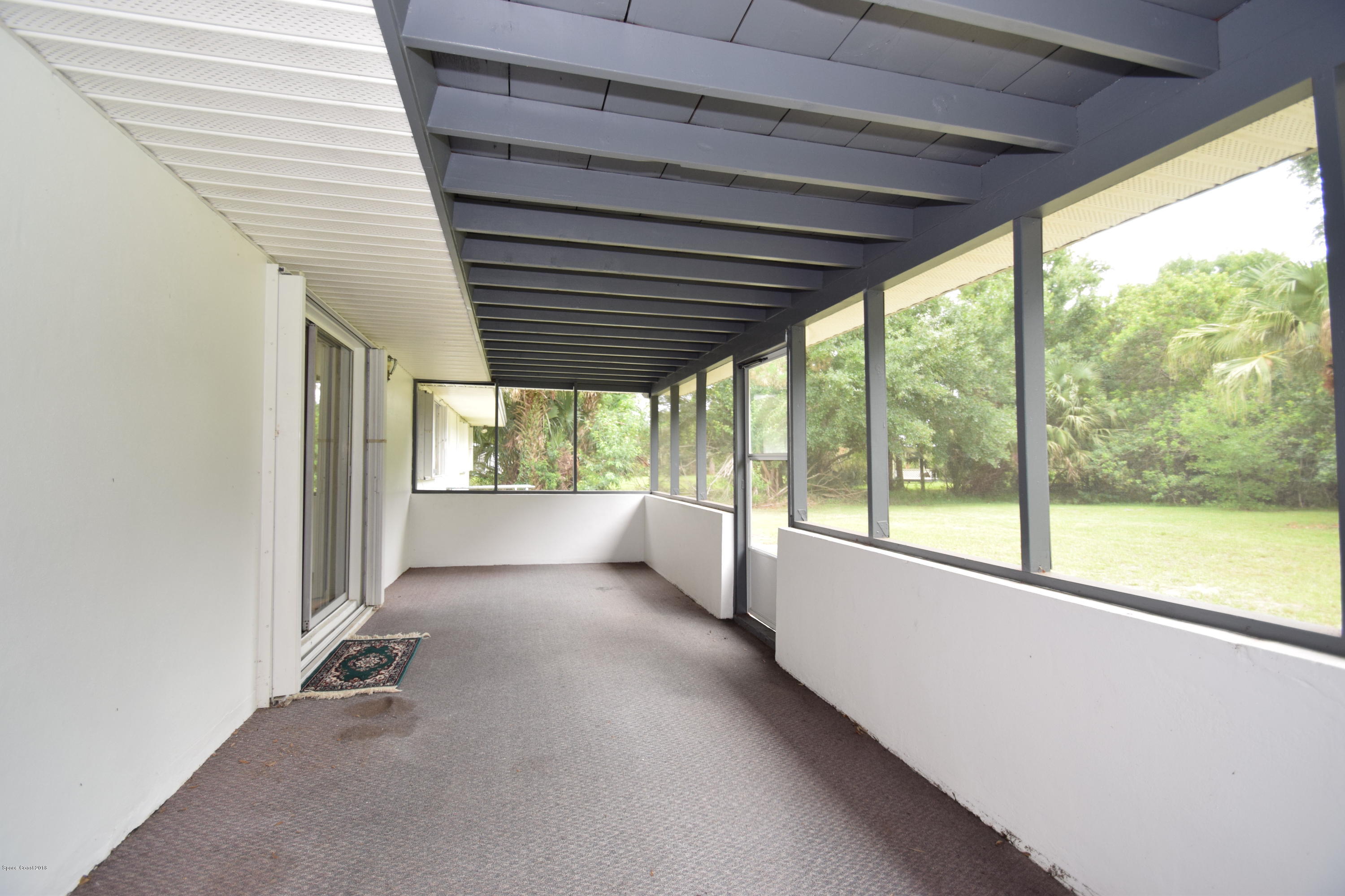 2715 Lakemont Road Melbourne, FL 32934 - Photo 9 of 15 Screened Patio