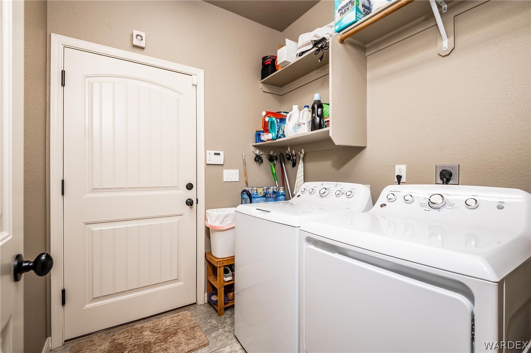 4870 North Old W Road Kingman, AZ 86401 - Photo 19 of 41 a utility room with dryer and washer