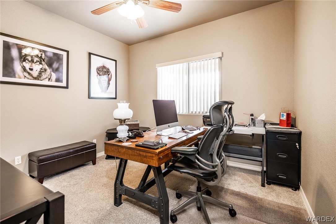 4870 North Old W Road Kingman, AZ 86401 - Photo 27 of 41 a workspace with furniture and window