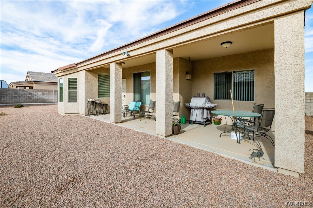 4870 North Old W Road Kingman, AZ 86401 - Photo 36 of 41 a house with porch and furniture