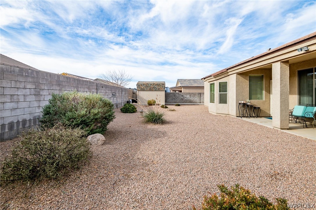 4870 North Old W Road Kingman, AZ 86401 - Photo 37 of 41 a view of a house with backyard and sitting area
