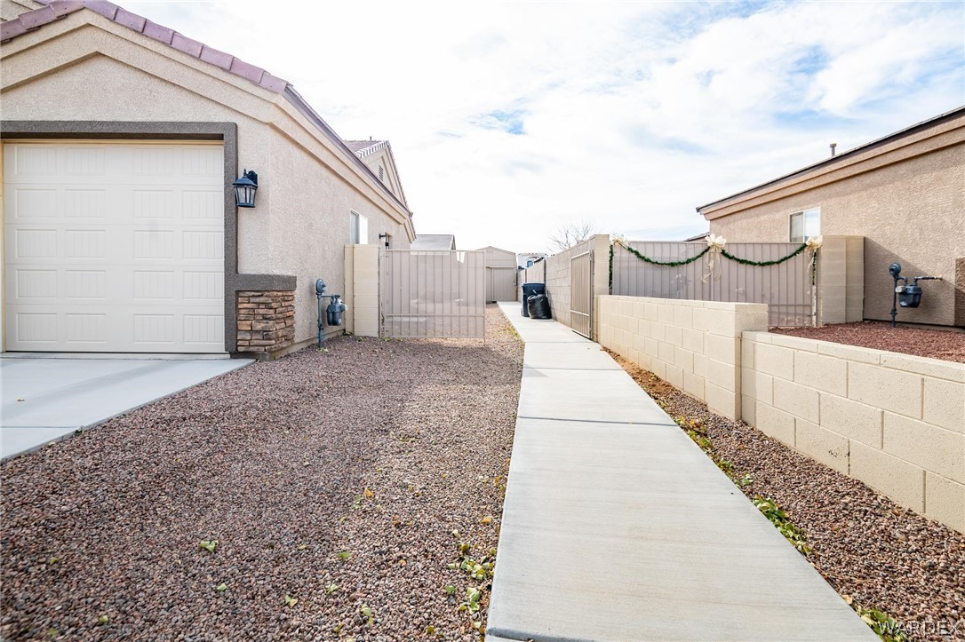 4870 North Old W Road Kingman, AZ 86401 - Photo 5 of 41 a view of a house with barbeque area
