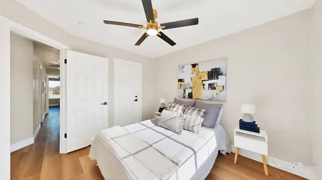 a workspace with furniture and a potted plant