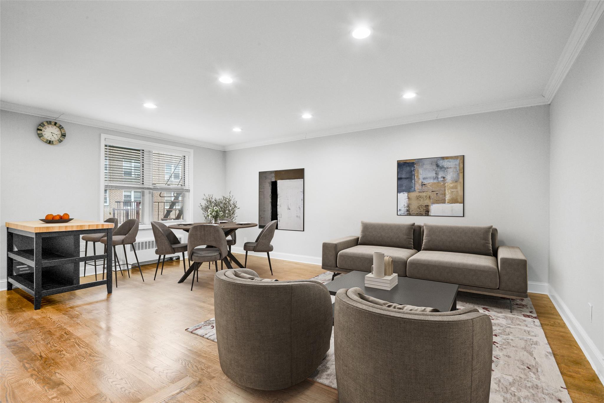 1 Vincent Road, Unit 3P Bronxville, NY 10708 - Photo 1 of 1 Virtually staged living room featuring ornamental molding, radiator, and light hardwood floors