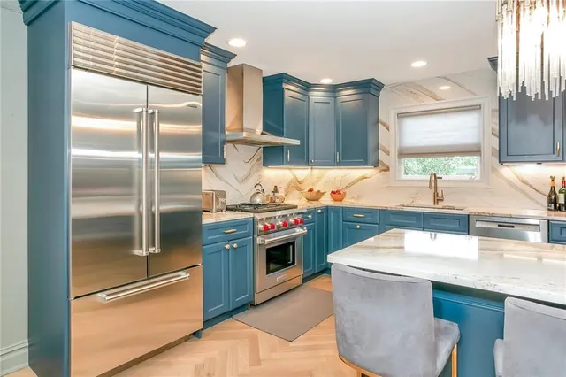 a bedroom with two beds and a television