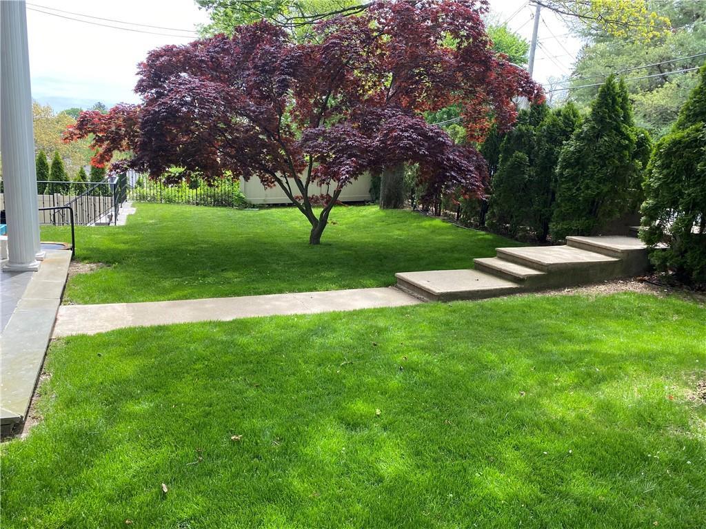 433 New Rochelle Road Bronxville, NY 10708 - Photo 30 of 41 a view of yard with green space