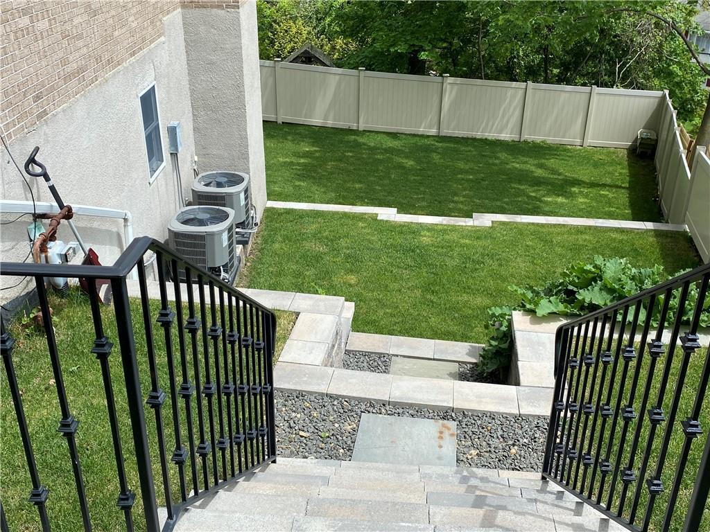 433 New Rochelle Road Bronxville, NY 10708 - Photo 34 of 41 a view of a porch with a yard