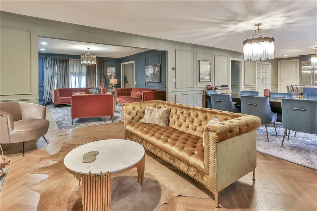 433 New Rochelle Road Bronxville, NY 10708 - Photo 9 of 41 a living room with furniture and a wooden floor