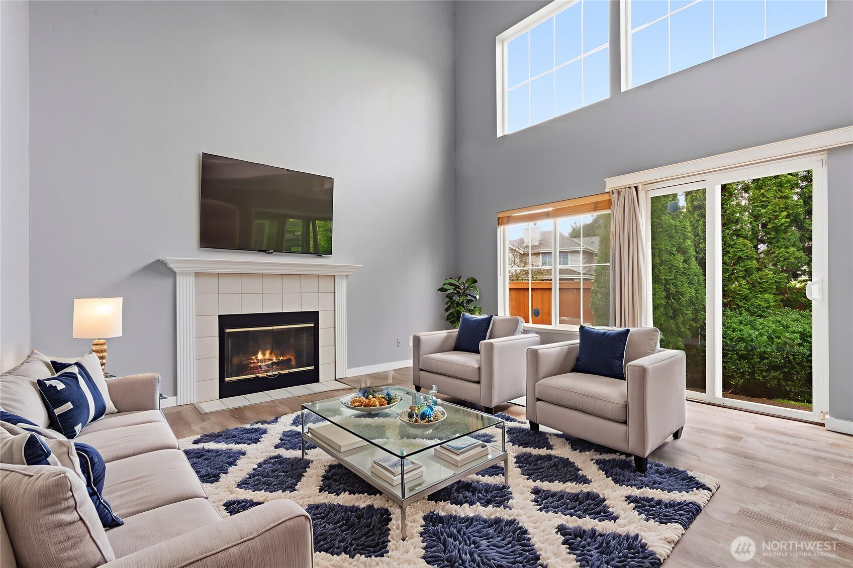 5624 South 233rd Street, Unit 41 Kent, WA 98032 - Photo 2 of 37 a living room with furniture and a fireplace
