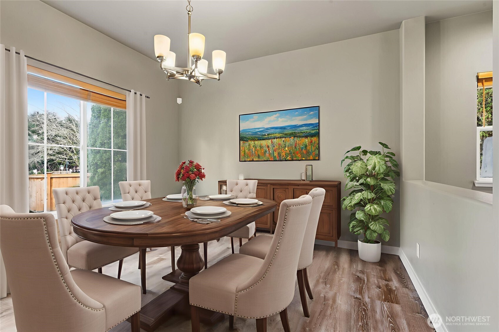 5624 South 233rd Street, Unit 41 Kent, WA 98032 - Photo 3 of 37 a view of a dining room with furniture wooden floor and a chandelier