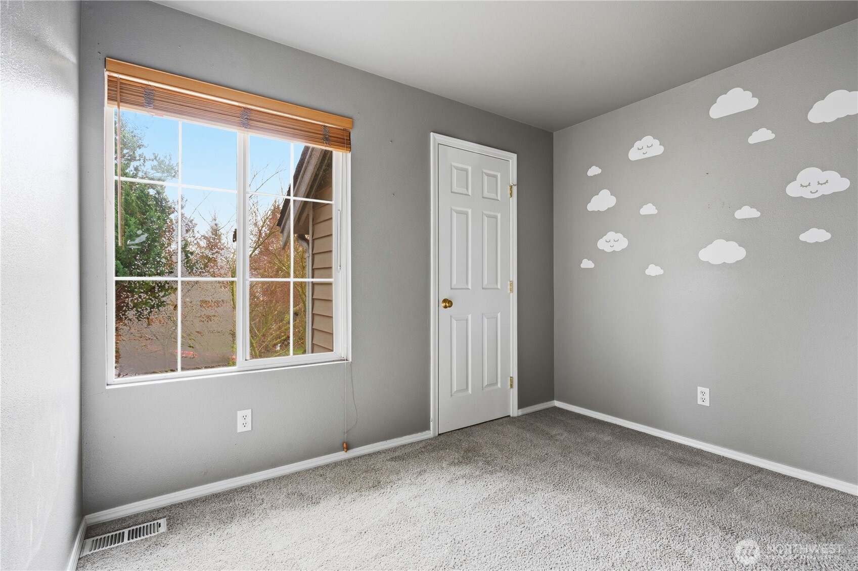5624 South 233rd Street, Unit 41 Kent, WA 98032 - Photo 31 of 37 an empty room with windows and closet