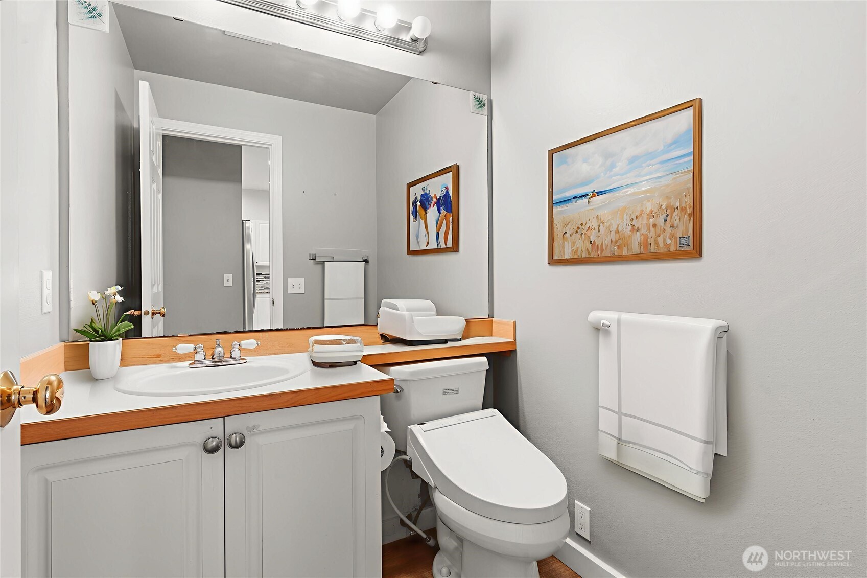 5624 South 233rd Street, Unit 41 Kent, WA 98032 - Photo 6 of 37 a bathroom with a granite countertop sink mirror vanity and toilet