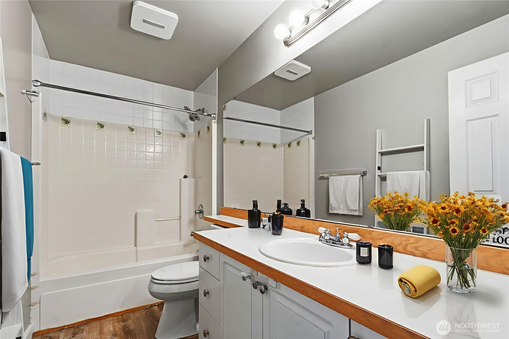 5624 South 233rd Street, Unit 41 Kent, WA 98032 - Photo 8 of 37 a bathroom with a double vanity sink toilet mirror and shower