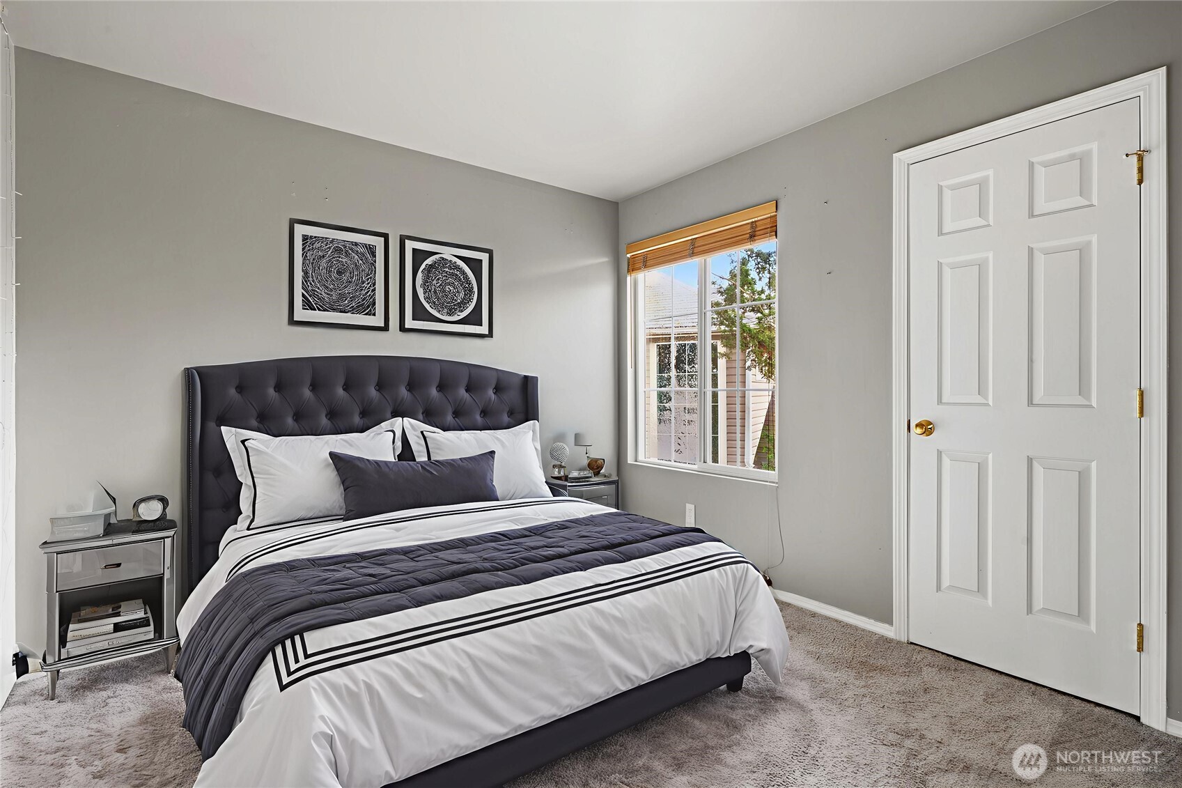 5624 South 233rd Street, Unit 41 Kent, WA 98032 - Photo 9 of 37 a bedroom with a large bed and a window