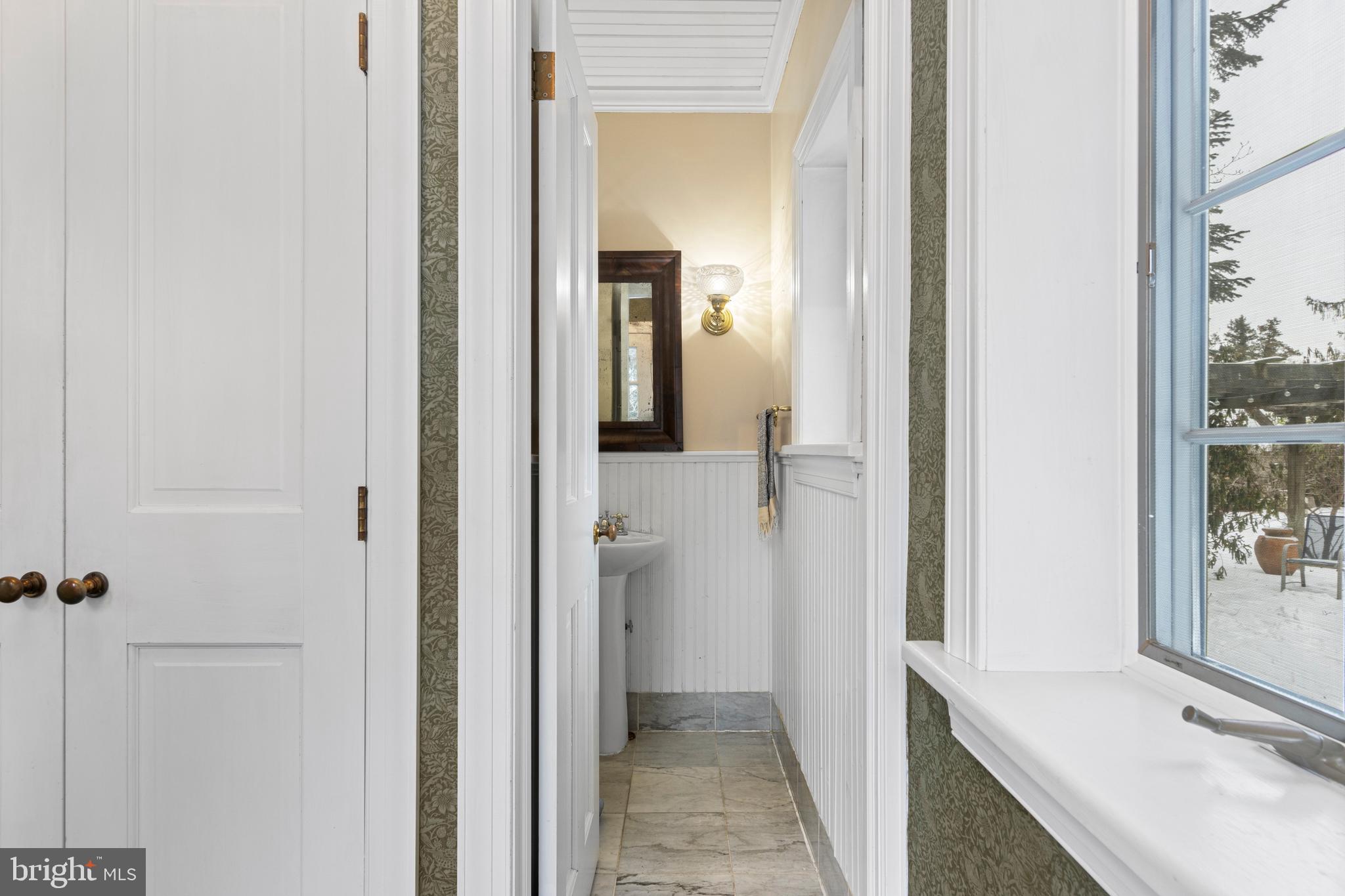 1009 Bent Road Media, PA 19063 - Photo 15 of 42 Powder Room off Side Entry