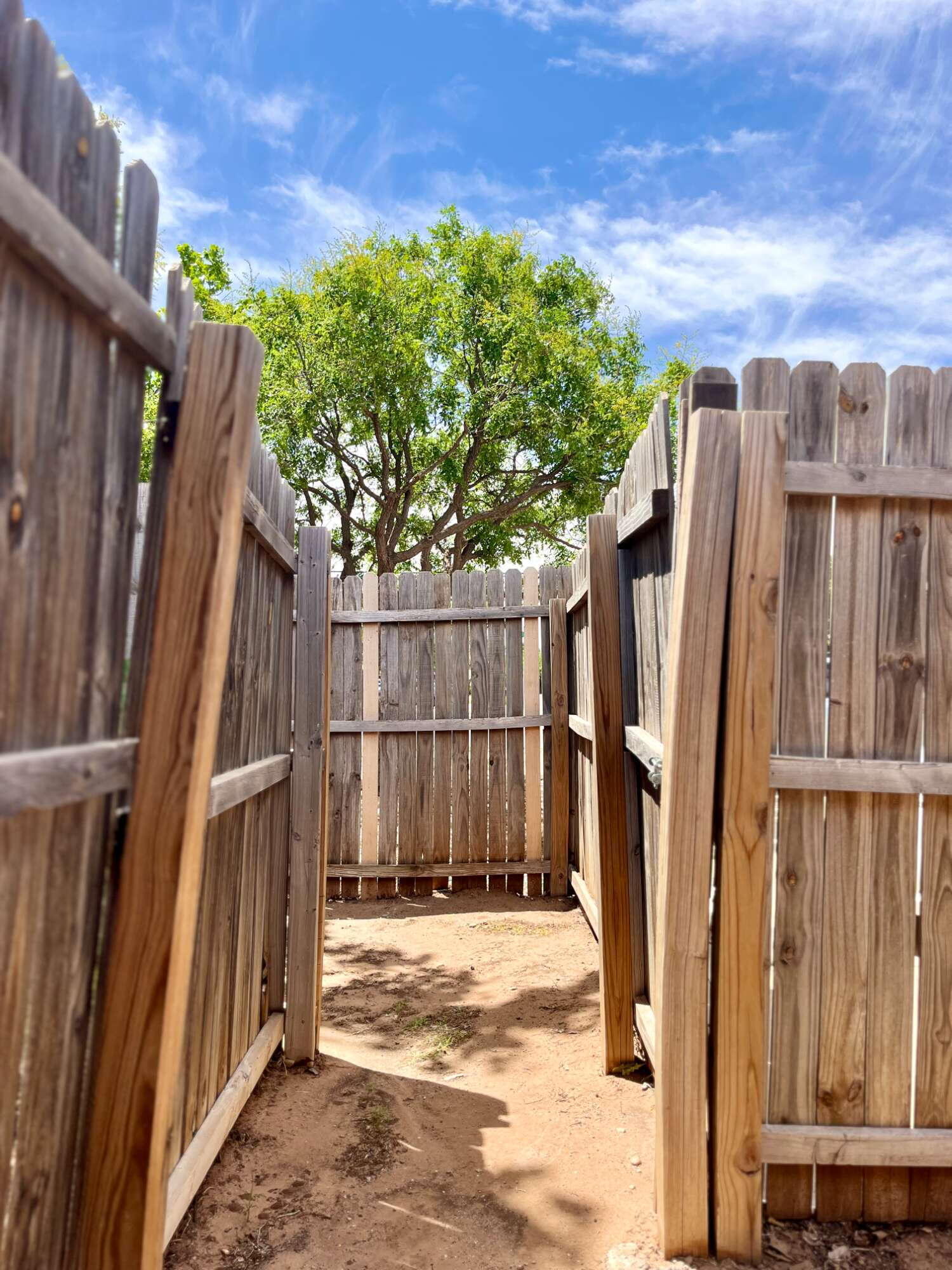 2308 74th Street, Unit B3 Lubbock, TX 79423 - Photo 16 of 18 a view of outdoor space with wooden fence