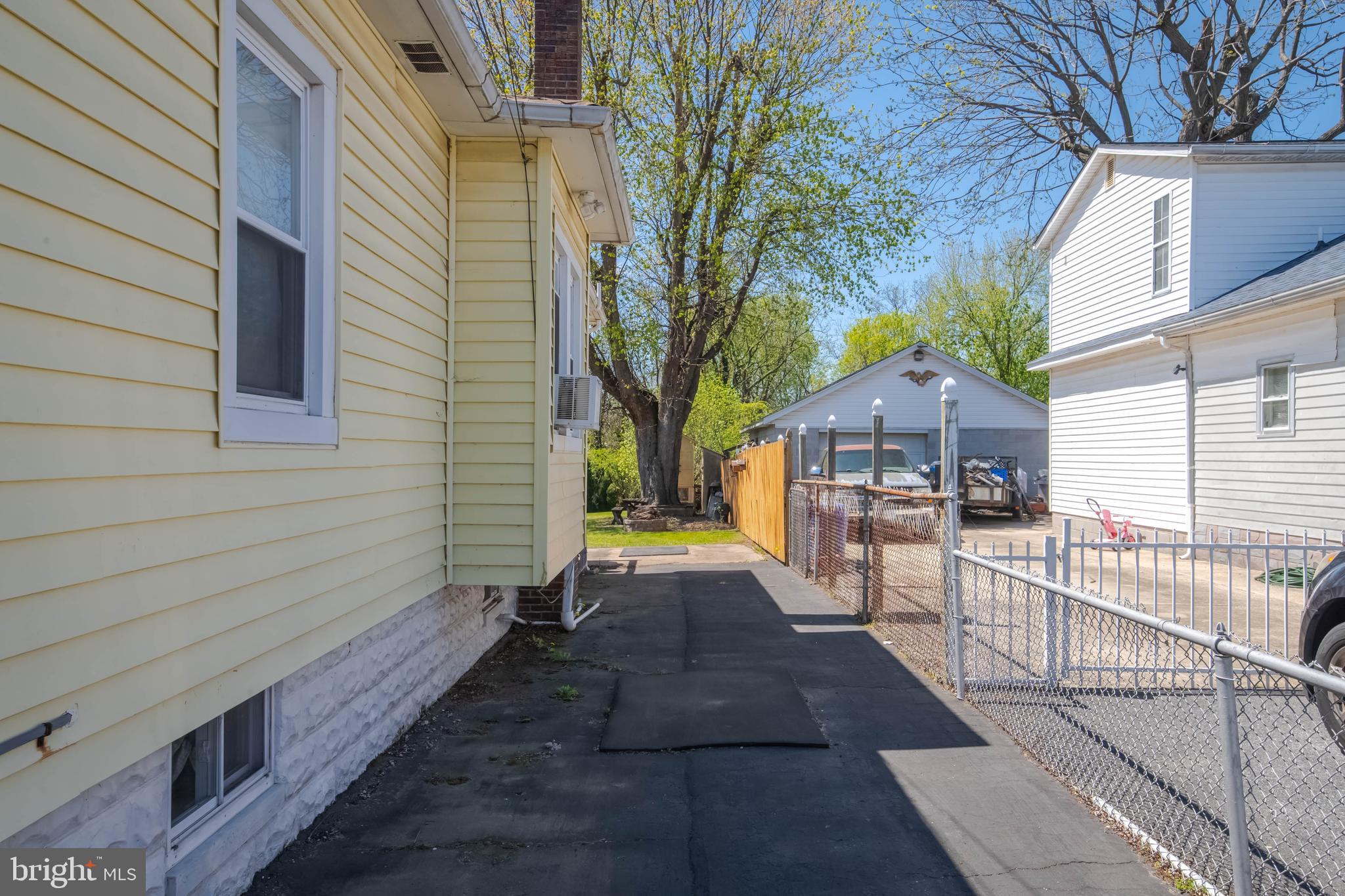 318 Lorraine Avenue Baltimore, MD 21221 - Photo 24 of 27 a view of house with wooden stairs