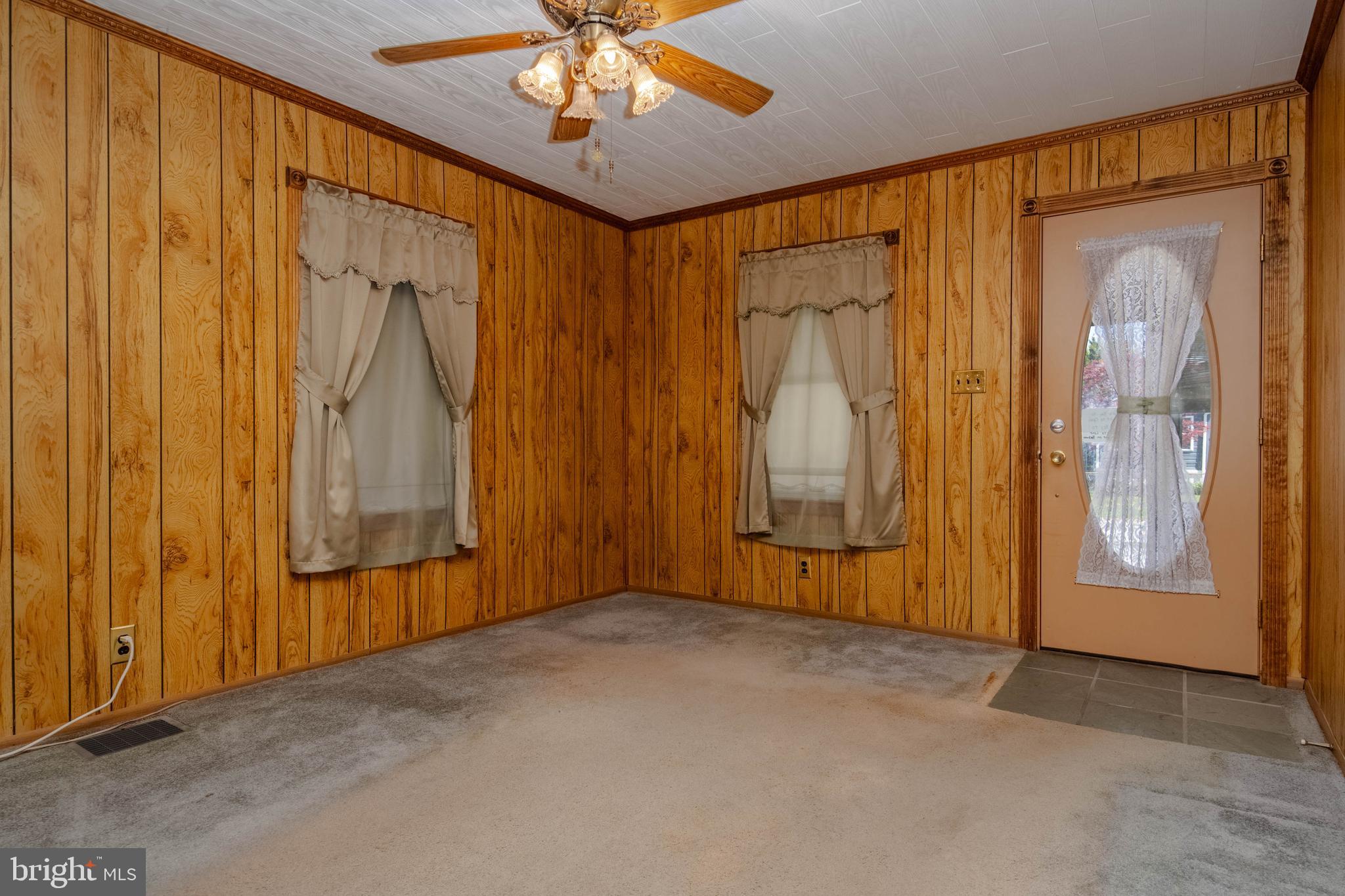318 Lorraine Avenue Baltimore, MD 21221 - Photo 6 of 27 a view of an empty room with a window