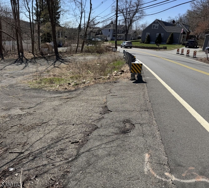 a view of a park with swings and slides