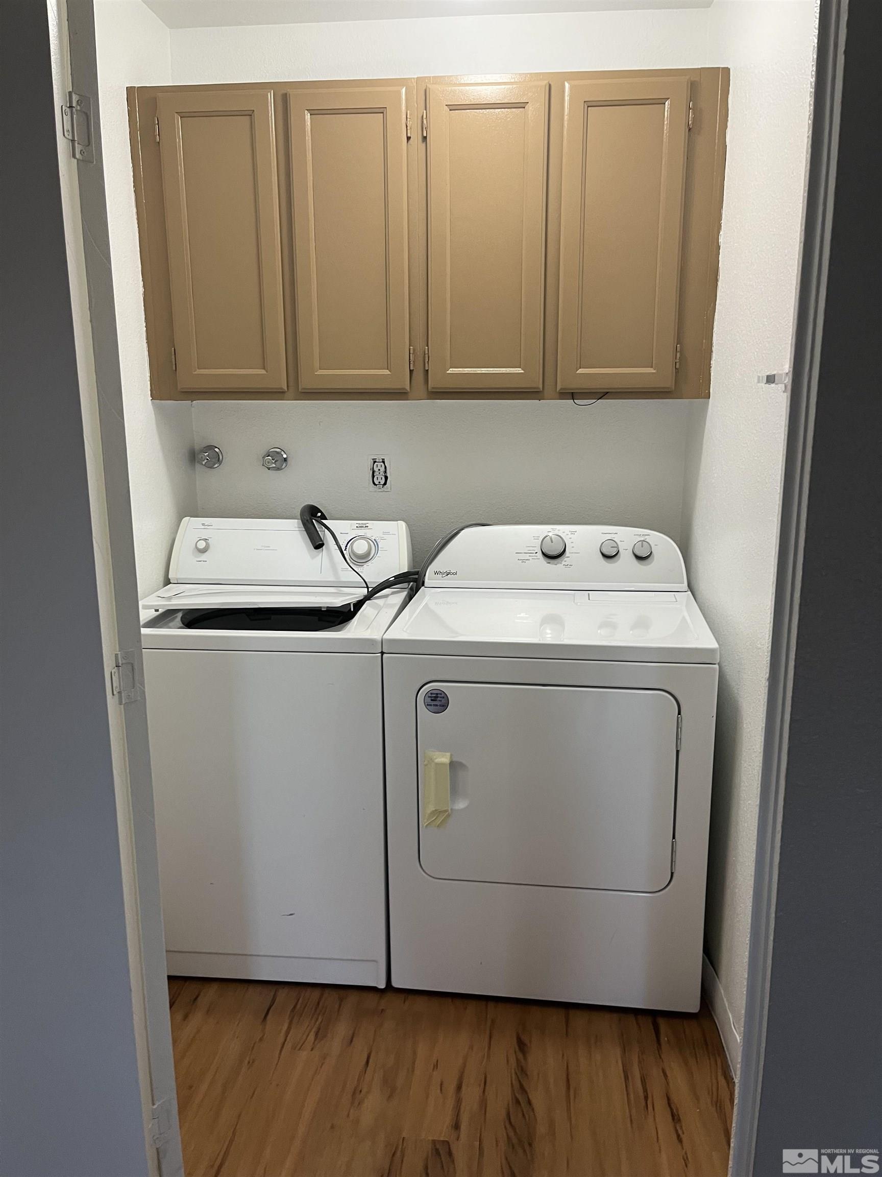 2197 Kietzke Lane, Unit E Reno, NV 89502 - Photo 6 of 7 a utility room with dryer and washer