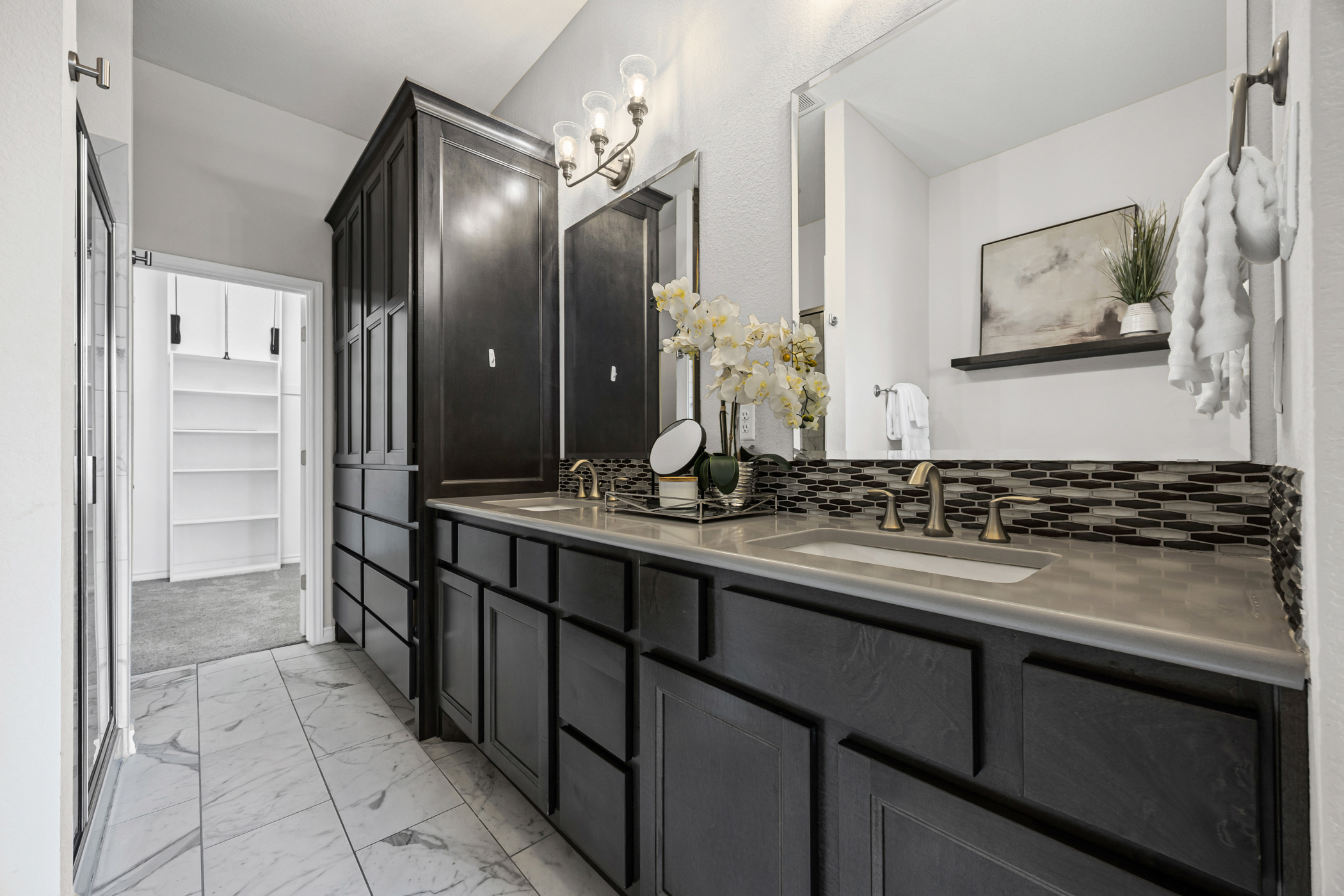 1112 Highknoll Lane Georgetown, TX 78628 - Photo 19 of 40 Ensuite with dual vanity, and an abundance of storage
