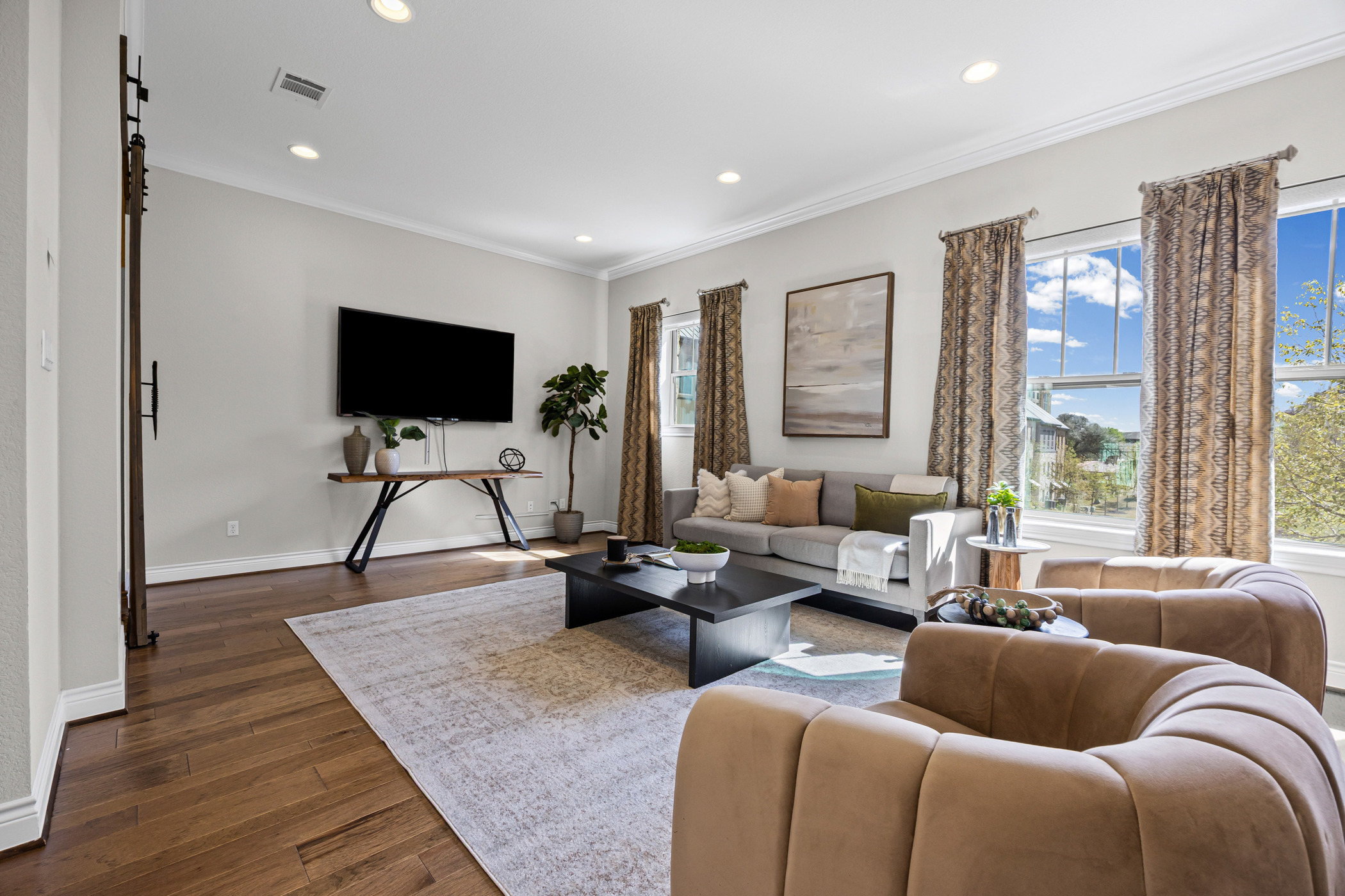 1112 Highknoll Lane Georgetown, TX 78628 - Photo 3 of 40 Main living level featuring rich hardwood flooring and open-concept design