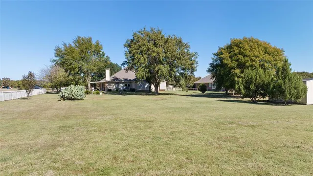 a view of road with trees