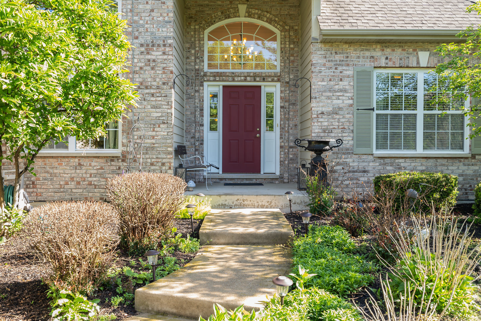 14 Winthrop New Road Sugar Grove, IL 60554 - Photo 2 of 25 a front view of a house with a yard