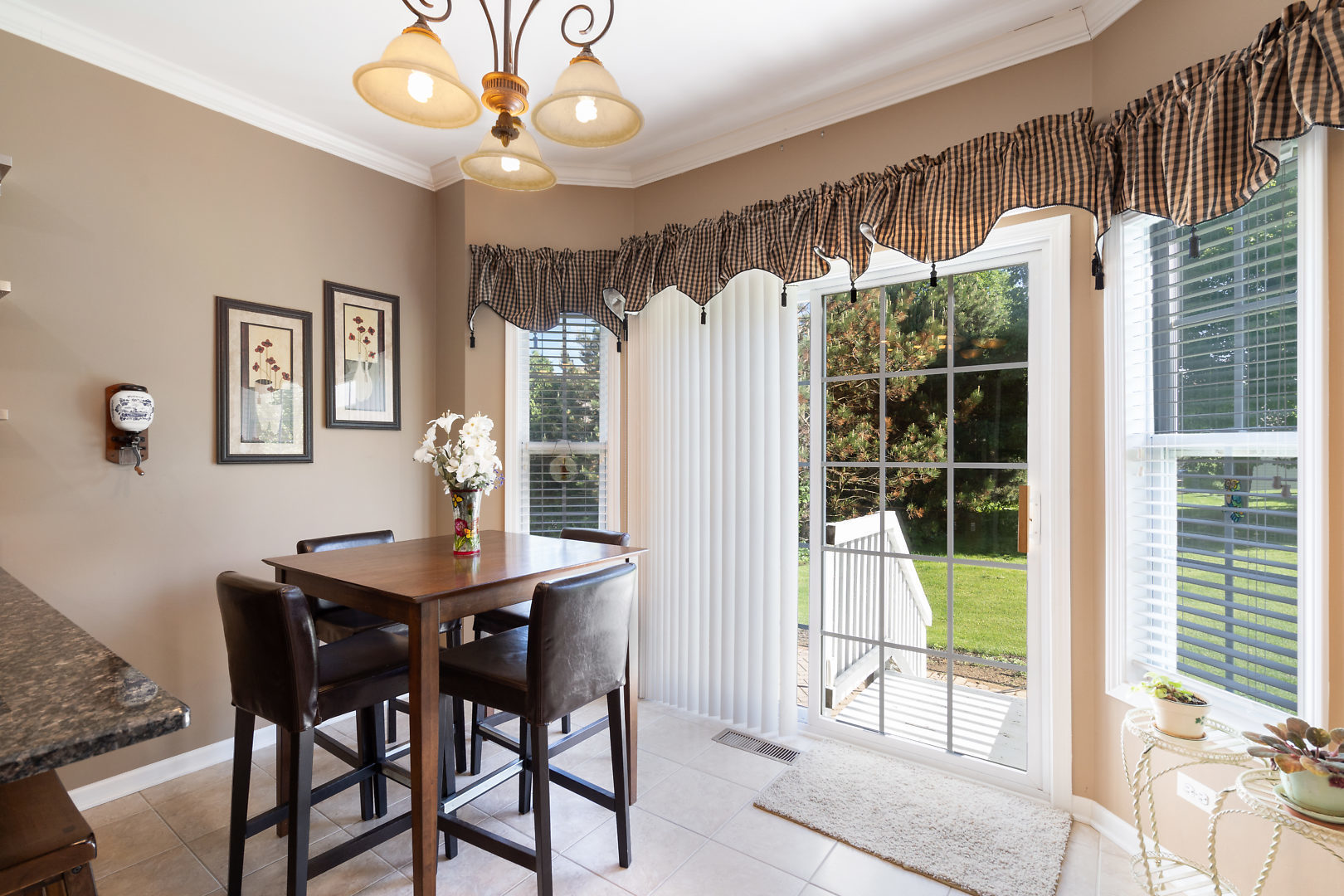 14 Winthrop New Road Sugar Grove, IL 60554 - Photo 11 of 25 a view of a dining room with furniture window and wooden floor